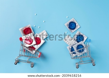 Top view blue and red condoms arrangement