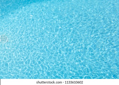 top view blue water caustics background
