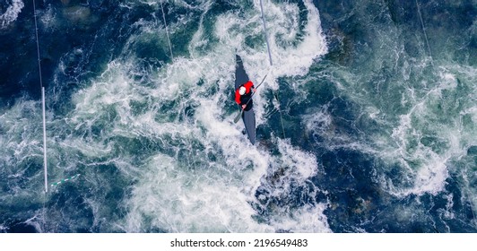 Top view boat of kayaker on mountain rough blue river, extreme sport kayak, aerial drone photo. - Powered by Shutterstock