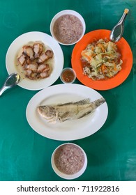 Top View Of Boiled Mixed White And Brown Rice With Cooked Vegetables, Steamed Fish And Crispy Deep Fried Pork, Chinese Style Dish, Concept Of Diet Or Healthy Food And Lifestyle