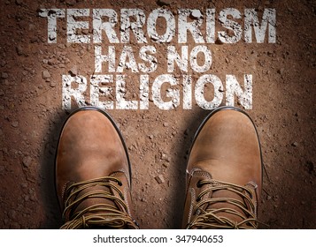 Top View Of Boot On The Trail With The Text: Terrorism Has No Religion