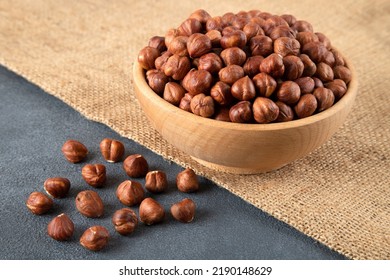 Top view of a bowl full of hazelnuts - Shutterstock ID 2190148629