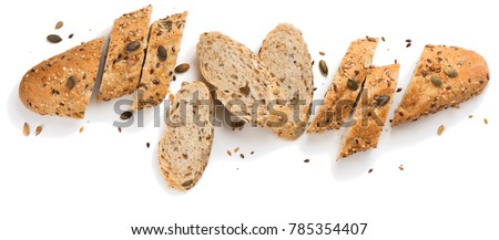 Top view of bread with different seeds ( pumpkin,  poppy, flax, sunflower, sesame,  millet ) decorated with wheat ears isolated on white background.