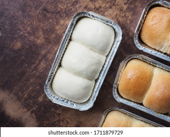 Top View Bread Roll In Aluminium Tin Foil Box On Wooden Table.