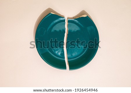 Similar – Artistic broken plates