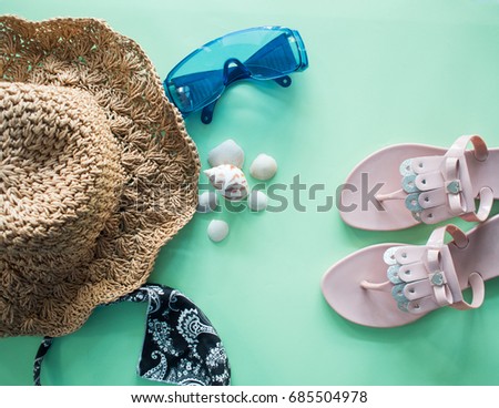 Top view of brown hat women and pink shoes for sea concept, fashion of women, Travel concept