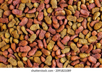 Top View Of Brown Kibble Pieces Of Dry Cat Food As A Textured Pattern