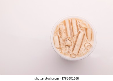 Top View Bubble Milk Tea With Ice In Plastic Glass On White Background