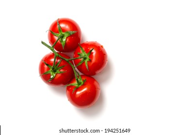 Top view of bunch of fresh tomatoes isolated on white background 