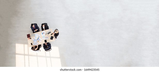 Top View Of Business Diverse People And  Meeting Team At Desk, Aerial View Of Header Or Banner Businessman And Businesswoman Sitting Around A Conference Table