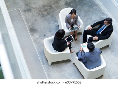 Top View Of Business People Discussion At Open Area