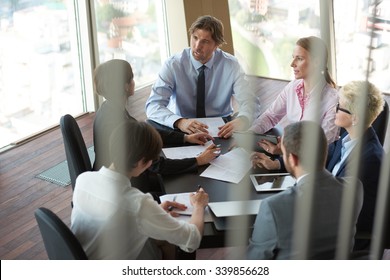 Top View Of  Business People Group On Meeting, Working In Modern Bright Office Indoor With Tablet Computer