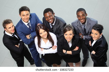 Top View Of Business People With Their Hands Together