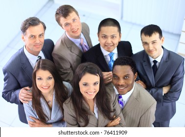 Top View Of Business People With Their Hands Together