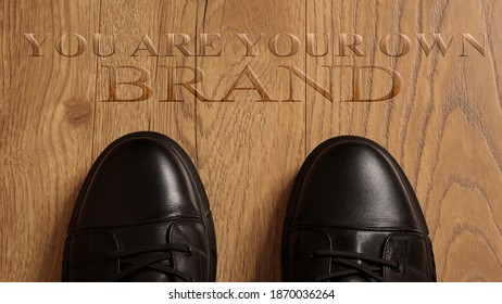 Top View of Business Shoes on the floor with the text: You Are Your Own Brand