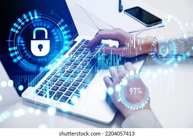 Top view of businessman fingers typing on laptop keyboard, double exposure, forex candlesticks and bar chart hud, glowing security lock and data protection. Concept of big business data