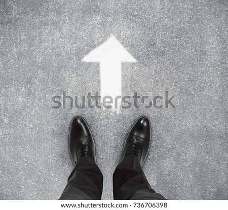 Similar – feet of a man standing inside a big puddle after a heavy rain