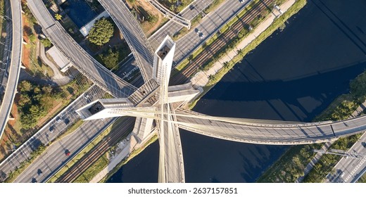 Top view of cable-stayed bridge, Marginal Pinheiros, and Pinheiros river in Sao Paulo city.