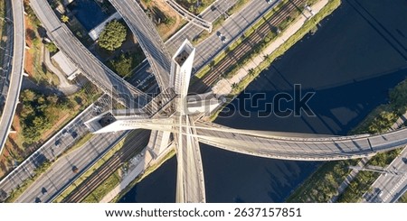 Top view of cable-stayed bridge, Marginal Pinheiros, and Pinheiros river in Sao Paulo city.