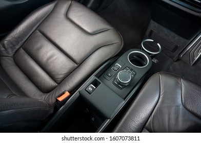 Top View Of Car Interior With Driver, Passenger Seat And Cup Holder On Background. Modern Car Interior Design.