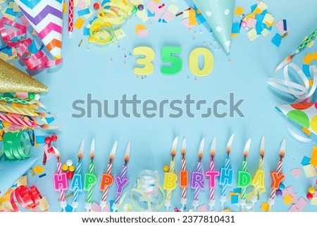 Top view card happy birthday with number  350. Copy space. Postcard holiday anniversary. Happy birthday multicolored background for mensto text, with a numeral with pretty decorations 