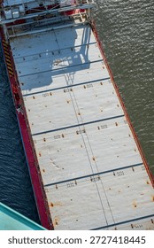 Top view of cargo ship deck with metal hatches