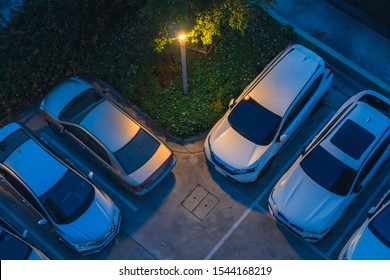 Top View Of Cars In Parking In Night