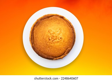 Top view cassava cake and gradient orange background 