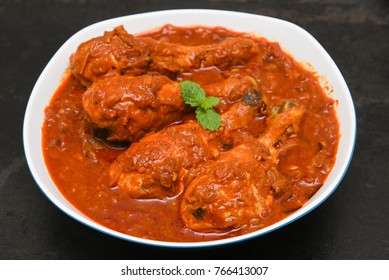 Top View Chettinad Chicken Curry Hot And Spicy Gravy Dish Tamil Nadu, India. South Indian Non Vegetarian Cuisine Prepared Use Coconut, Garam Masala. Popular Side Dish For Idiyappams, Appam, Rice.