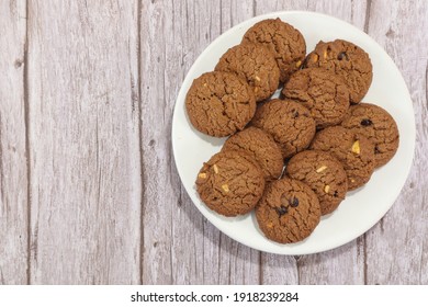 Top View Chocolate Cookies On The Plate