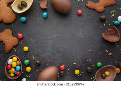 Top View Chocolate Easter Eggs With Candy Cookies Frame