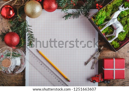 Top view for Christmas decorations with space for your wishes, wooden table top, for architects, engineers, builders, designers, draftsmen. place for text. Christmas background
