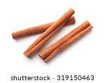 Top view of cinnamon sticks isolated on white