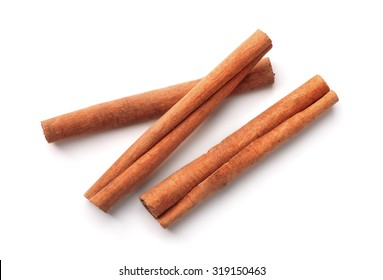 Top view of cinnamon sticks isolated on white - Shutterstock ID 319150463
