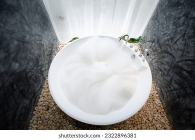 top view circle bathtub full with bath foam in bathroom, bathroom interior design