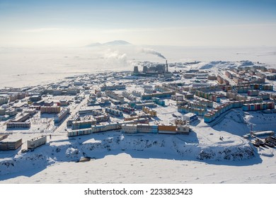 Top view of the city of Anadyr. Winter aerial photograph of a snow-covered town in the Arctic. Anadyr is the administrative center of the Chukotka Autonomous Okrug of the Russian Federation.