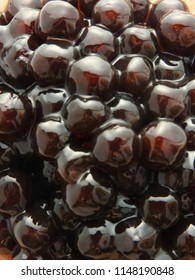 Top View And Close Up Of Black Tapioca Ball (also Known As Boba In Bubble Tea) Which Is Ingredients For Making Pearl Milk Tea, Other Taiwanese Drink And Shaved Ice At Dessert Shop. Food Background.