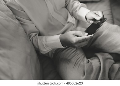 Top view close up of a man using mobile smart phone, mock up display