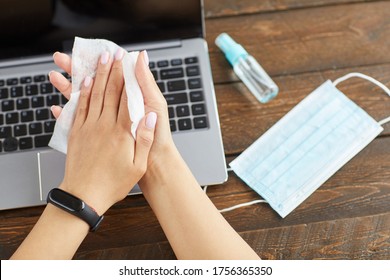 Top View Close Up Of Unrecognizable Young Woman Sanitizing Hands With Cleaning Wipes While Working At Home Office In Quarantine, Copy Space