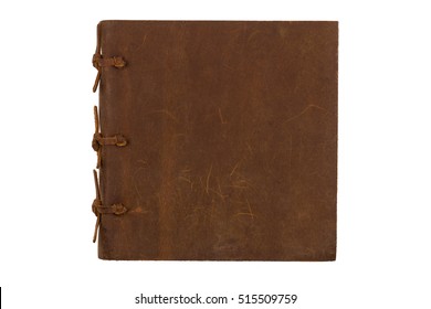 top view of closed notebook with leather brown and bindings cover isolated on white background