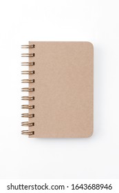 Top View Of Closed Spiral Blank Recycled Paper Cover Notebook On White Background Additional Clipping Path.