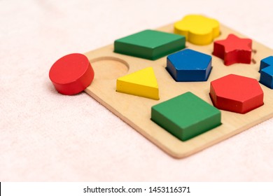 Top View Closeup Of Colorful Wooden Montessori Sensorial Material Learning, Shape And Color Block. Kindergarten Educational Toys, Thinking Process, Cognitive Skills, Learn Through Play Tools Concept.