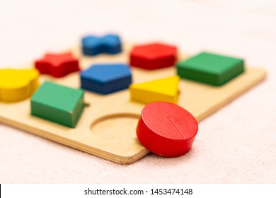 Top View Closeup Of Colorful Wooden Montessori Sensorial Material Learning, Shape And Color Block. Kindergarten Educational Toys, Thinking Process, Cognitive Skills, Learn Through Play Tools Concept.