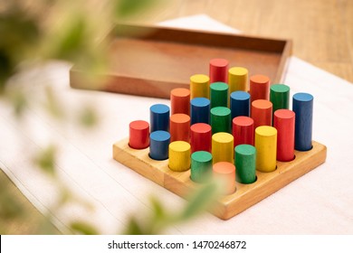 Top View Closeup Of Colorful Wooden Montessori Sensorial Material Learning, Sizing And Order Block. Kindergarten Educational Toys, Thinking Process, Cognitive Skills, Learn Through Play Tools Concept.