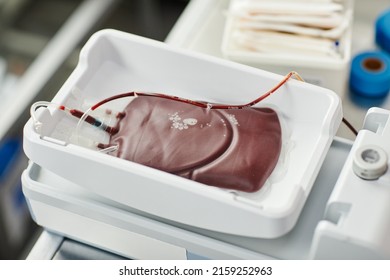 Top View Closeup Of Filled Blood Bag In Tray At Blood Donation Center, Copy Space