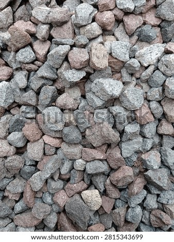 Top view close-up texture of crushed stone gravel aggregate material for construction
