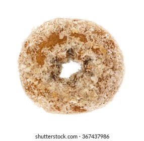 Top View Of A Coconut Flaked Plain Donut Isolated On A White Background.