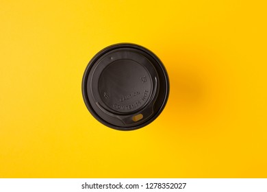 Top View Coffee Cup On Yellow Background, Takeaway Coffee Container, Plastic Lid