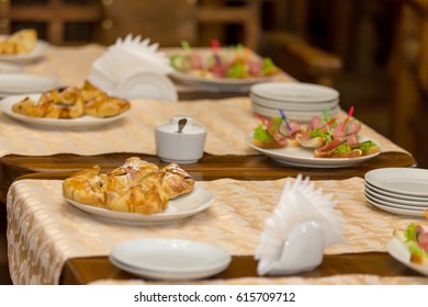 Top View Of Coffee, Sweets, Bread On The Table.Coffe Break