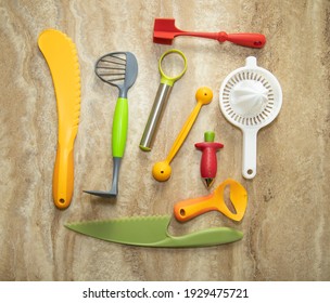 Top View Of A Collection Of Various Kitchen Gadgets.